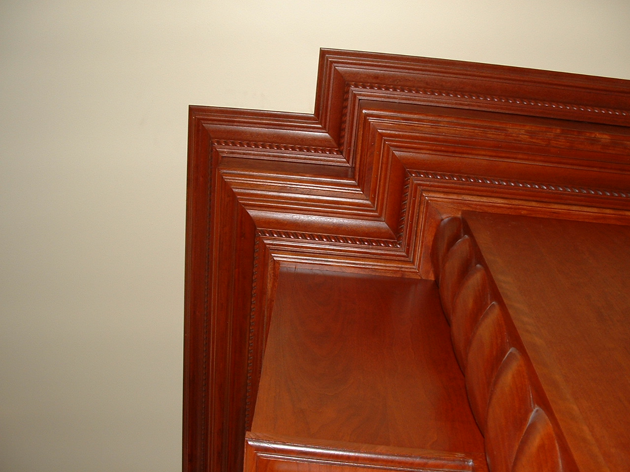 Multi-piece crown moulding stack on top of custom cabinetry